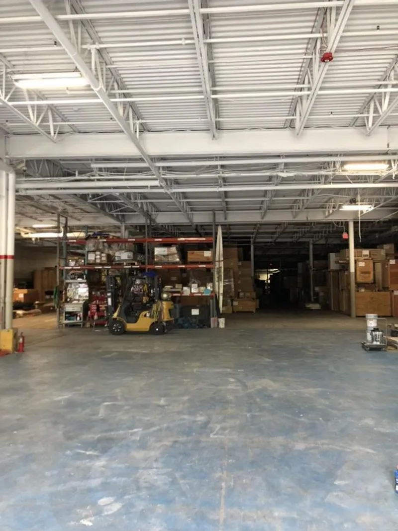 Warehouse ceiling deck vapor blasting - after